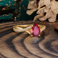 Timeless Vintage 4-Prong Pear-Cut Ruby Engagement Ring