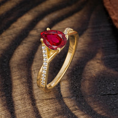 Timeless Vintage 4-Prong Pear-Cut Ruby Engagement Ring