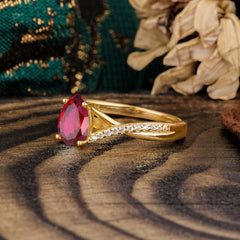 Timeless Vintage 4-Prong Pear-Cut Ruby Engagement Ring