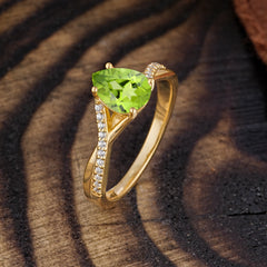 Timeless Vintage 4-Prong Pear-Cut Peridot Engagement Ring