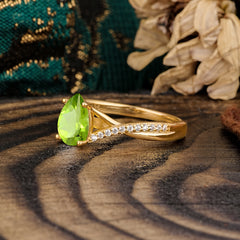 Timeless Vintage 4-Prong Pear-Cut Peridot Engagement Ring