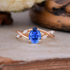 Lux Minimalist 4-Prong Pear-Cut Sapphire Engagement Ring