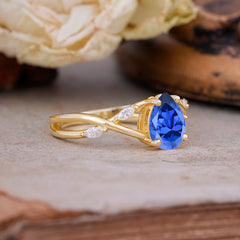 Lux Minimalist 4-Prong Pear-Cut Sapphire Engagement Ring