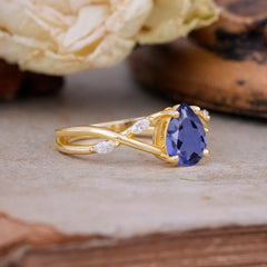 Lux Minimalist 4-Prong Pear-Cut Tanzanite Engagement Ring