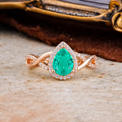 Dazzling 3 - Prong Pear-Cut Emerald Engagement Ring