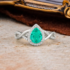Dazzling 3 - Prong Pear-Cut Emerald Engagement Ring