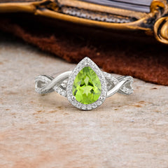 Dazzling 3 - Prong Pear-Cut Peridot Engagement Ring