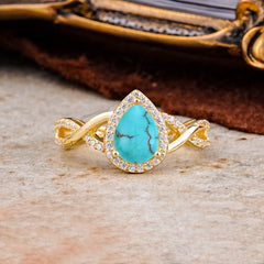 Dazzling 3 - Prong Pear-Cut Turquoise Engagement Ring