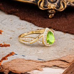 Dazzling 3 - Prong Pear-Cut Peridot Engagement Ring