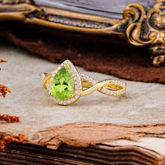 Dazzling 3 - Prong Pear-Cut Peridot Engagement Ring
