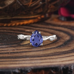 Nature-Inspired Classic 4-Prong Pear-Cut Tanzanite Engagement Ring