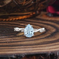 Nature-Inspired Classic 4-Prong Pear-Cut Aquamarine Engagement Ring