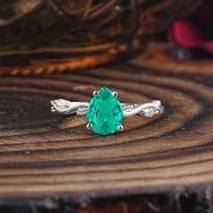 Nature-Inspired Classic 4-Prong Pear-Cut Emerald Engagement Ring