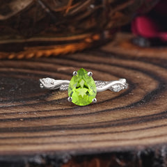 Nature-Inspired Classic 4-Prong Pear-Cut Peridot Engagement Ring