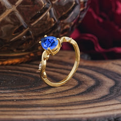 Nature-Inspired Classic 4-Prong Pear-Cut Sapphire Engagement Ring