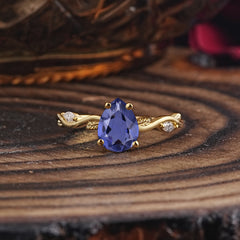 Nature-Inspired Classic 4-Prong Pear-Cut Tanzanite Engagement Ring