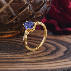 Nature-Inspired Classic 4-Prong Pear-Cut Tanzanite Engagement Ring