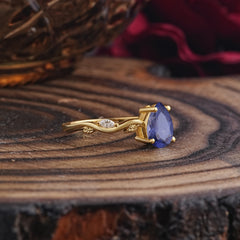 Nature-Inspired Classic 4-Prong Pear-Cut Tanzanite Engagement Ring