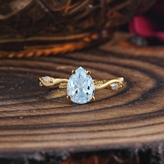 Nature-Inspired Classic 4-Prong Pear-Cut Aquamarine Engagement Ring