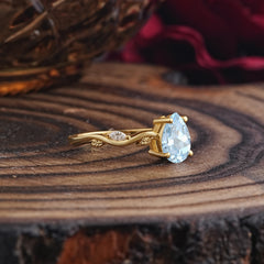 Nature-Inspired Classic 4-Prong Pear-Cut Aquamarine Engagement Ring