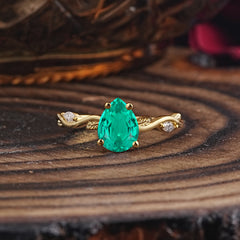Nature-Inspired Classic 4-Prong Pear-Cut Emerald Engagement Ring