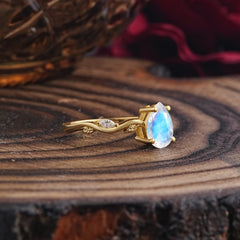 Nature-Inspired Classic 4-Prong Pear-Cut Moonstone Engagement Ring