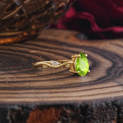 Nature-Inspired Classic 4-Prong Pear-Cut Peridot Engagement Ring