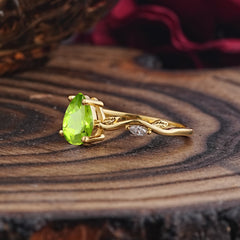 Nature-Inspired Classic 4-Prong Pear-Cut Peridot Engagement Ring