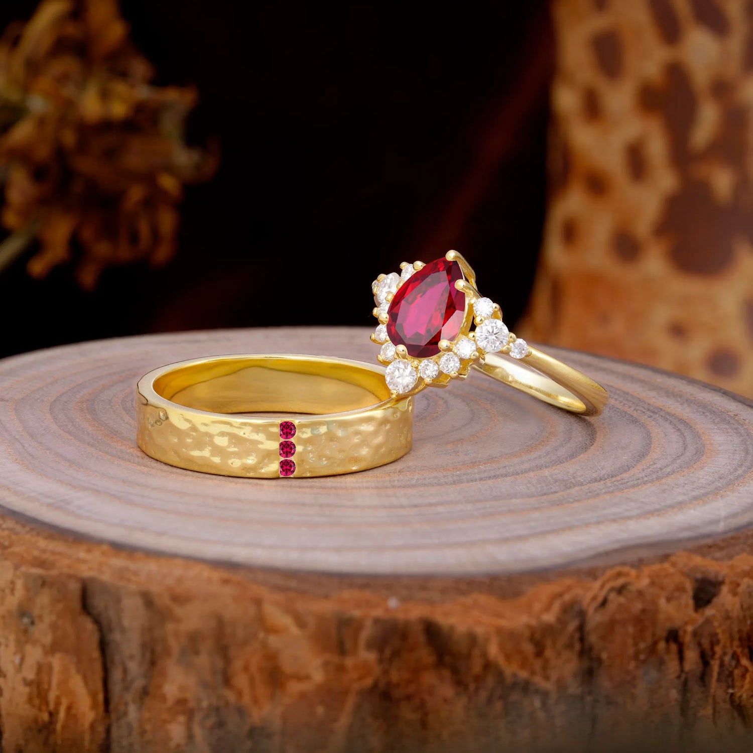 Luxurious 5-Prong Pear-Cut Ruby Engagement Couple Rings
