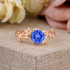 Nature-Inspired Classic 4-Prong Round Sapphire Engagement Ring