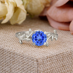 Nature-Inspired Classic 4-Prong Round Sapphire Engagement Ring