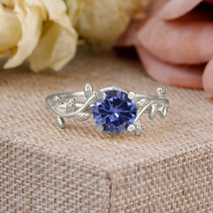 Nature-Inspired Classic 4-Prong Round Tanzanite Engagement Ring