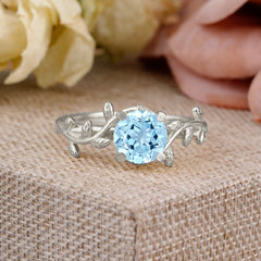 Nature-Inspired Classic 4-Prong Round Aquamarine Engagement Ring
