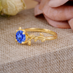 Nature-Inspired Classic 4-Prong Round Sapphire Engagement Ring