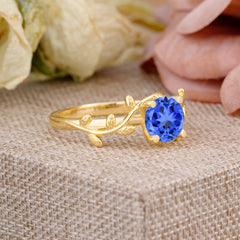 Nature-Inspired Classic 4-Prong Round Sapphire Engagement Ring