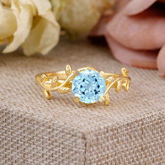 Nature-Inspired Classic 4-Prong Round Aquamarine Engagement Ring