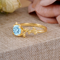 Nature-Inspired Classic 4-Prong Round Aquamarine Engagement Ring