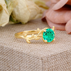 Nature-Inspired Classic 4-Prong Round Emerald Engagement Ring
