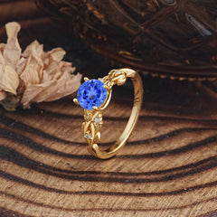 Vintage 4-Prong Round Cut Sapphire Engagement Ring