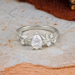 Haute Nature Inspired 4-Prong Oval Moissanite Ring