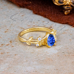Luxury Vintage Haute Nature Inspired 4-Prong Oval Sapphire Ring