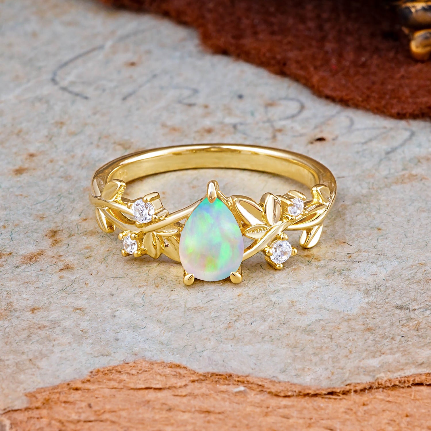 Haute Nature Inspired 4-Prong Oval Opal Engagement Ring