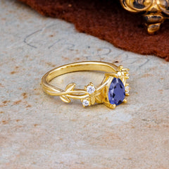 Luxury Vintage Haute Nature Inspired 4-Prong Oval Tanzanite Ring