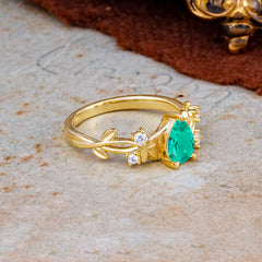 Luxury Vintage Haute Nature Inspired 4-Prong Oval Emerald Ring