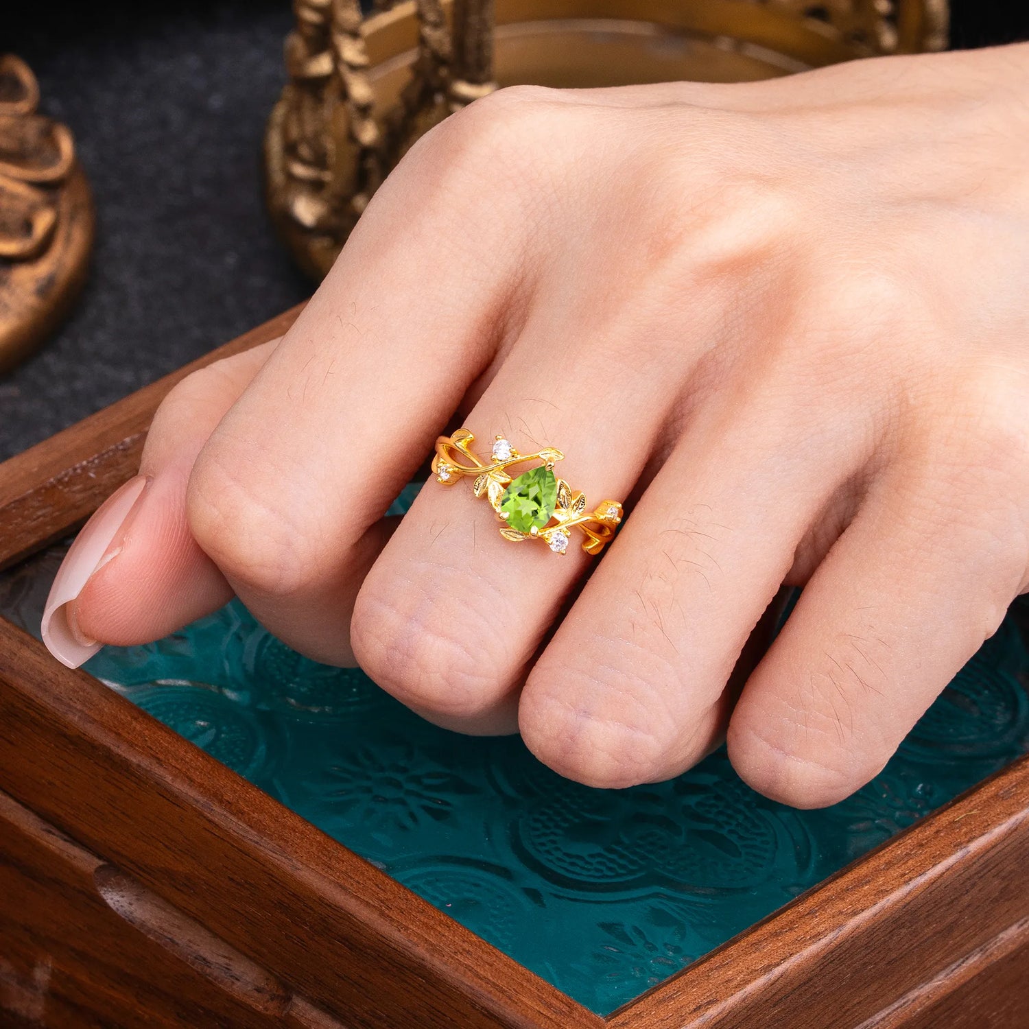 Branch-Inspired 3-Prong Pear-Cut Peridot Engagement Ring