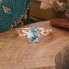 Artistic Twisted Shank Oval Cut Moss Agate Engagement Ring