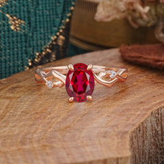 Artistic Twisted Shank Oval Cut Ruby Engagement Ring