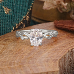 Artistic Twisted Shank Oval Cut Moissanite Engagement Ring