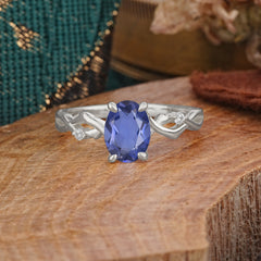 Artistic Twisted Shank Oval Cut Tanzanite Engagement Ring