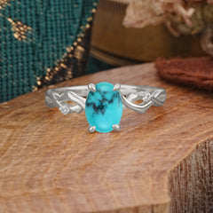 Artistic Twisted Shank Oval Cut Turquoise Engagement Ring